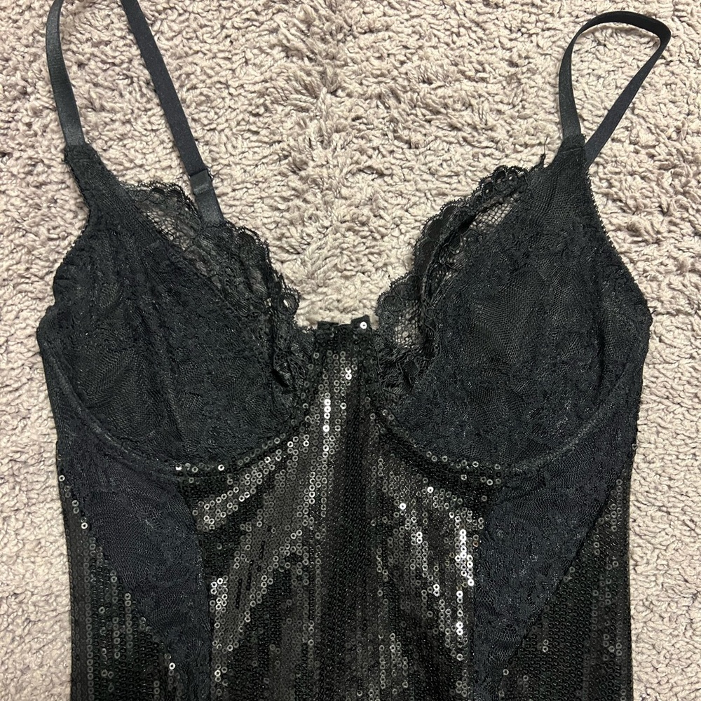 Black sequin 6126 Lindsay Lohan collection dress. Size small which is like a 2